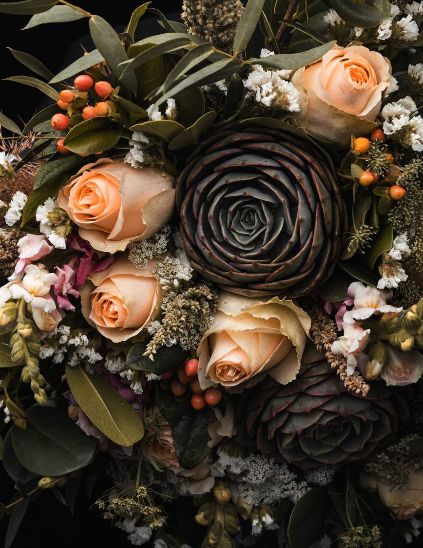 A vertical closeup shot of a luxurious bouquet of orange and brown roses on a black background